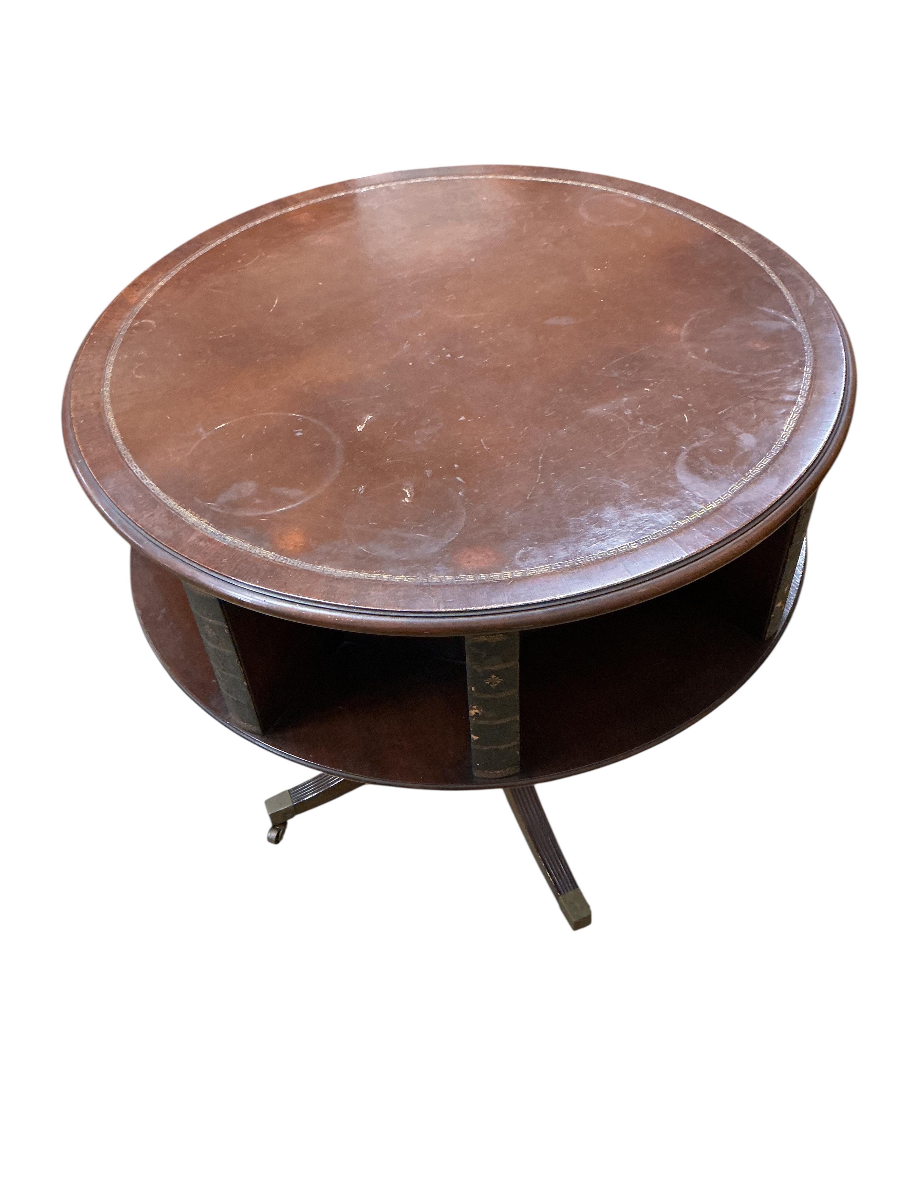 A George III style circular mahogany reading table, diameter 80cm, height 77cm